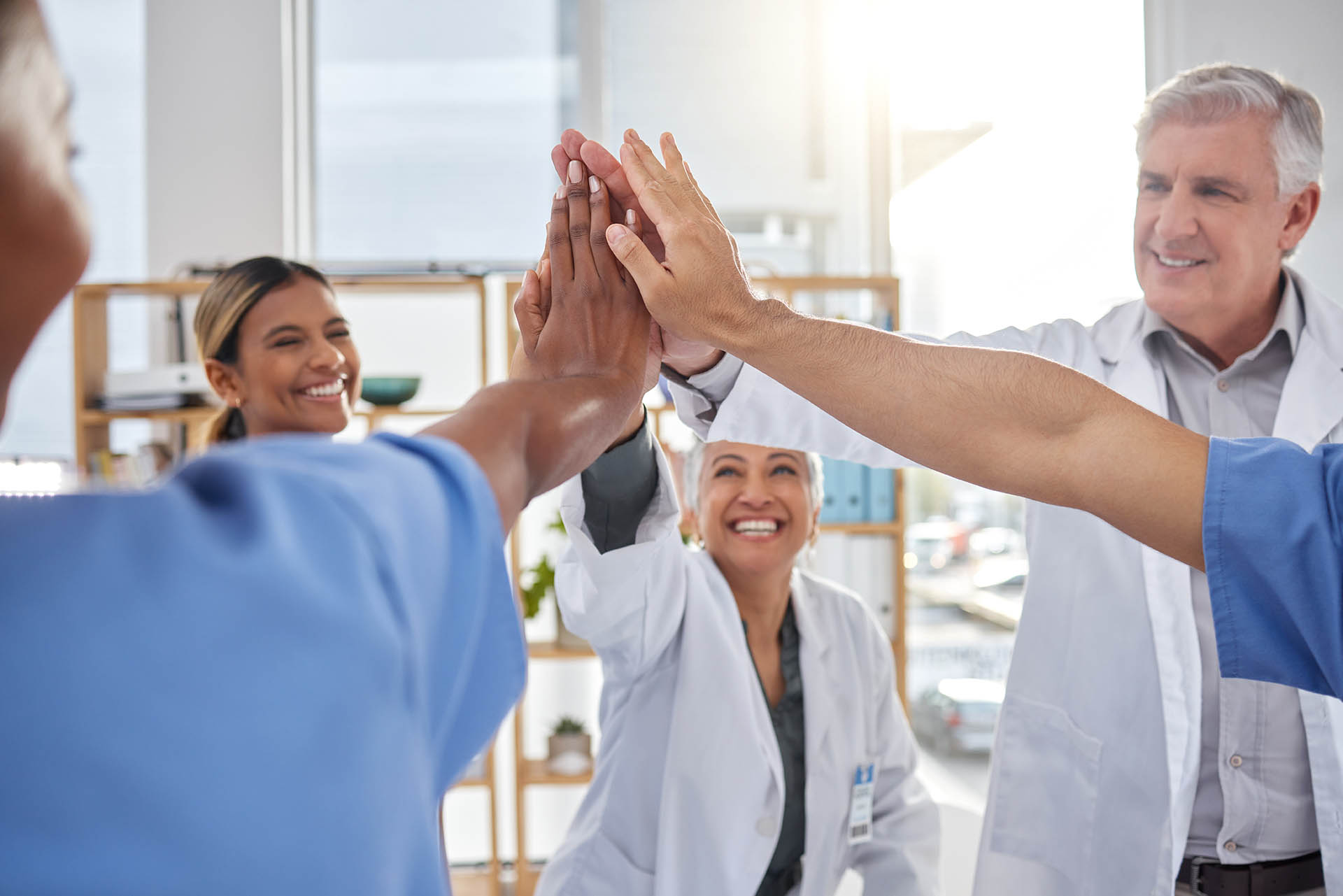 Success, high five or nurses in meeting for a strategy, goals or